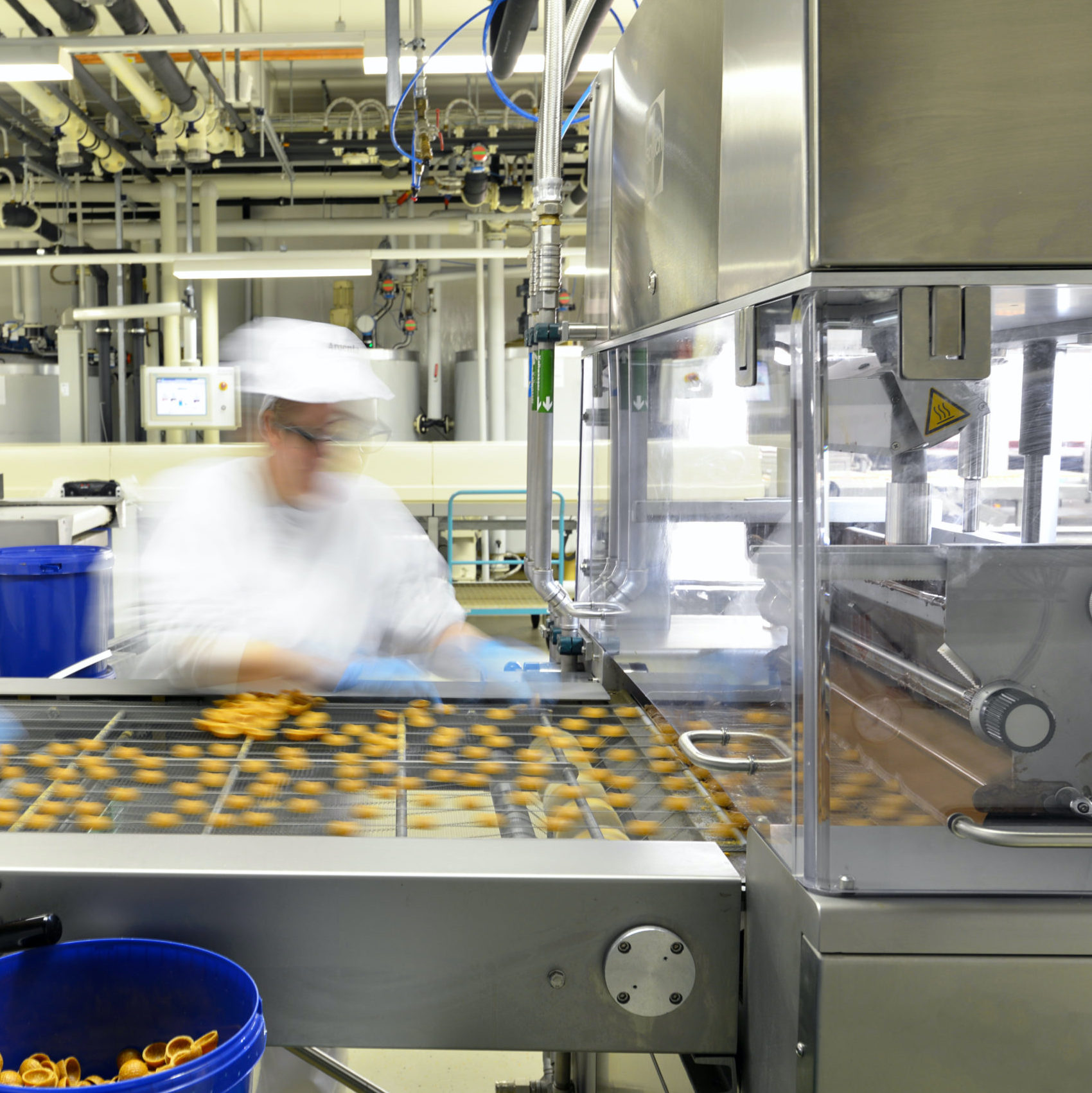food manufacturer inspecting production