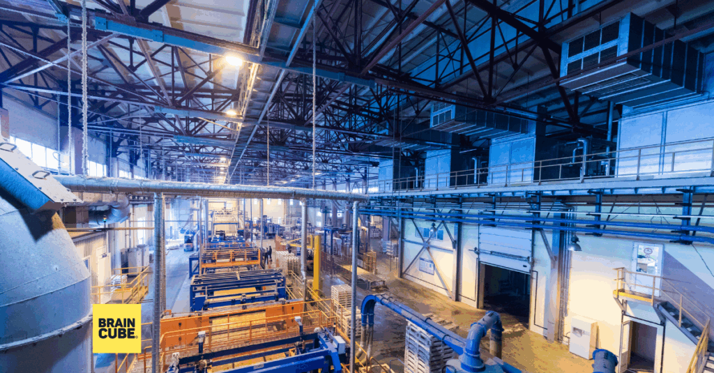 Photograph of a connected factory floor representing the WEMEQ framework for improving manufacturing productivity, with icons symbolizing Waste, Efficiency, Materials, Energy, and Quality.